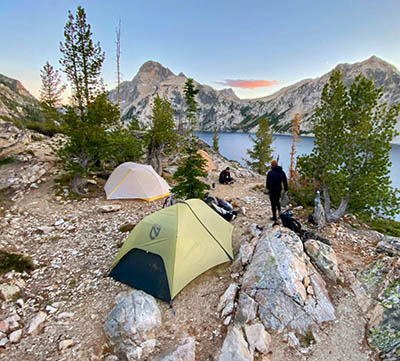 Backpacking shelters set up at a scenic campsite