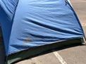 rented 3-man tent shown with fly cover
