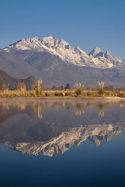 Scenic lake setting experienced using rented camping gear